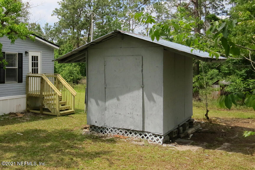 4512 Racoon Run Middleburg, FL 32068 - Photo 34 of 36 Storage Shed