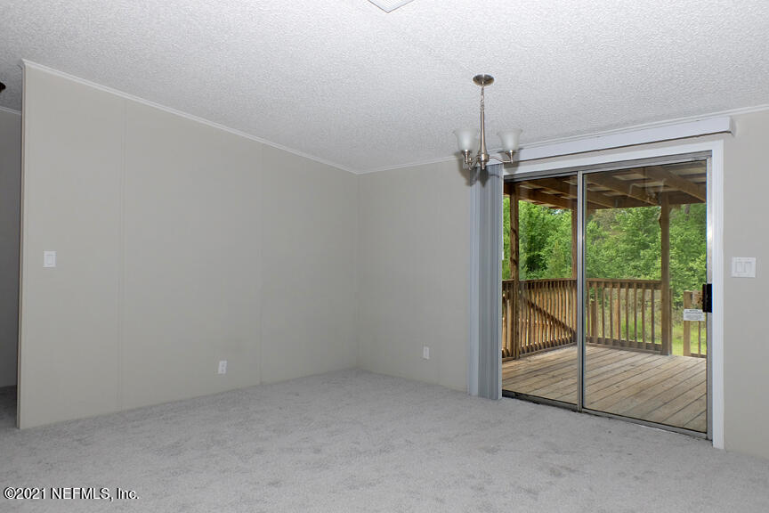 4512 Racoon Run Middleburg, FL 32068 - Photo 7 of 36 Formal Dining Room