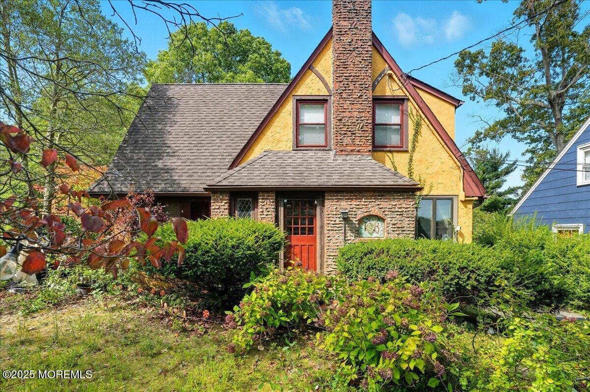 108 Pine Street Toms River, NJ 08753 - Photo 1 of 16 a front view of a house with plants and trees