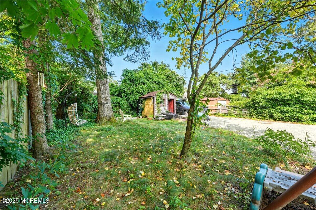 108 Pine Street Toms River, NJ 08753 - Photo 14 of 16 a view of a house with a yard