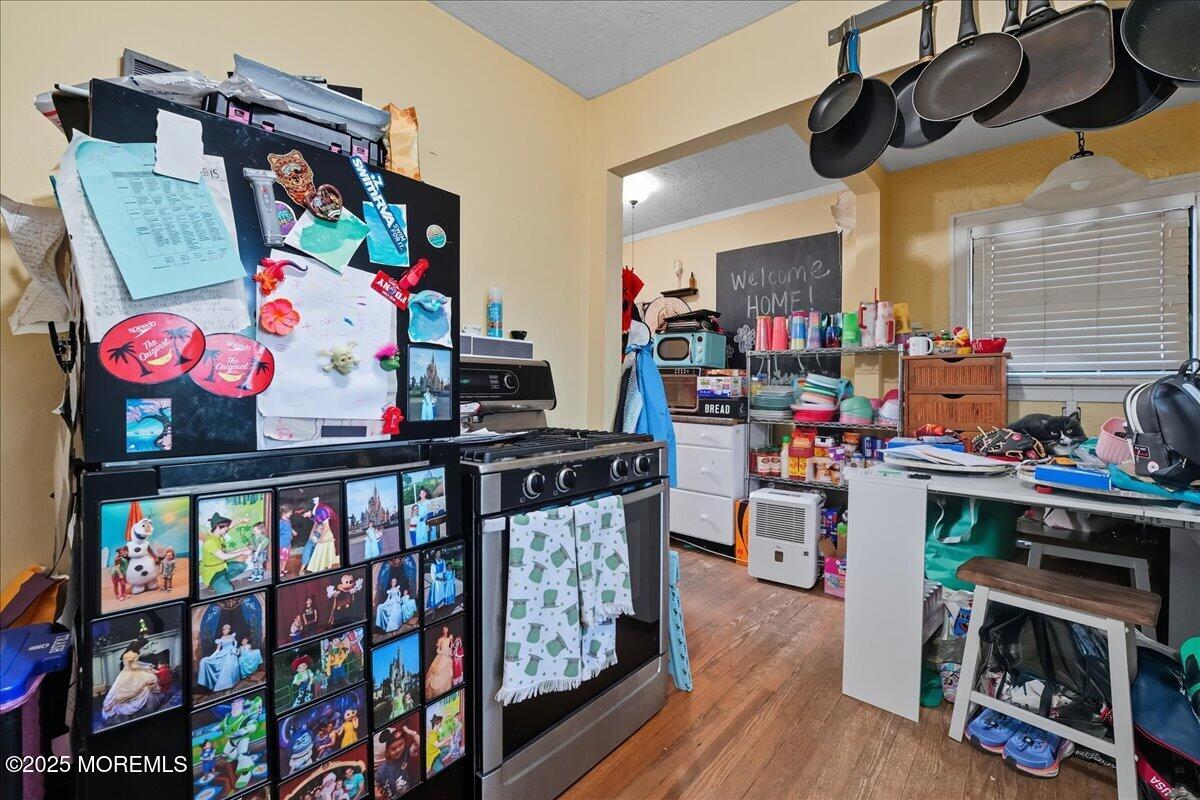 108 Pine Street Toms River, NJ 08753 - Photo 5 of 16 a kitchen area with furniture and wooden floor