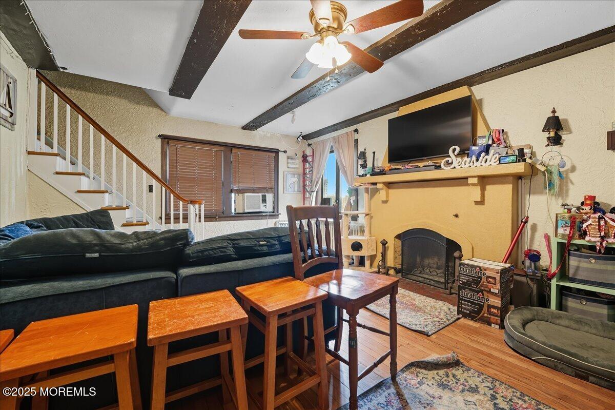 108 Pine Street Toms River, NJ 08753 - Photo 9 of 16 a living room with furniture fireplace and flat screen tv