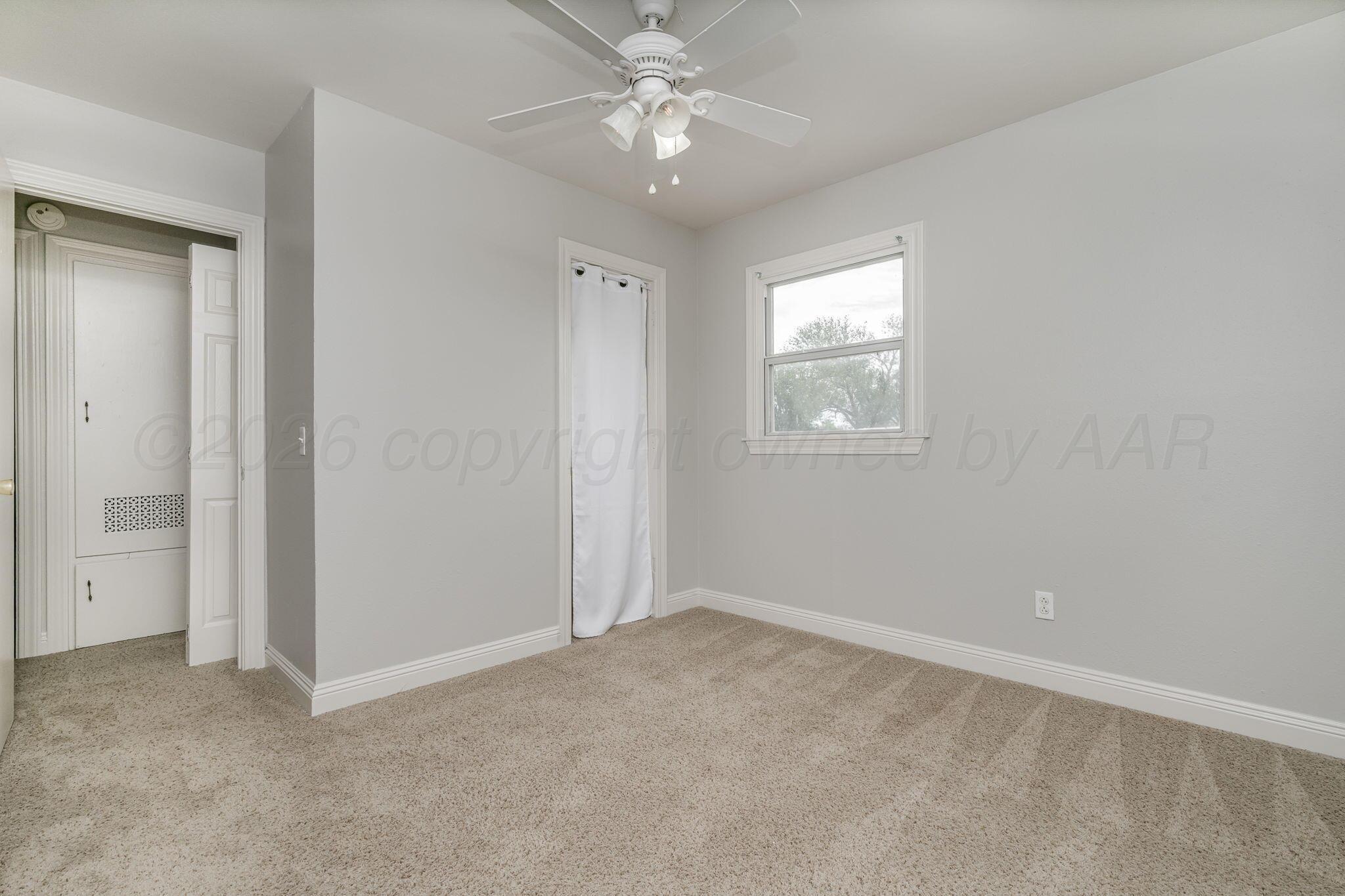 911 West 3rd Street Canyon, TX 79015 - Photo 13 of 18 Bedroom 2