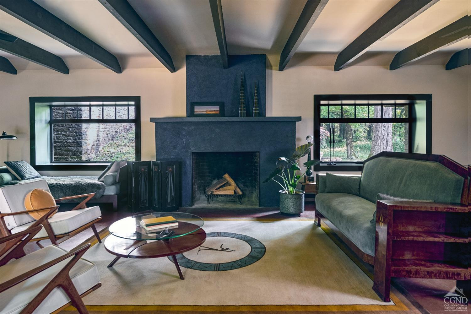 5280 Cauterskill Road Catskill, NY 12414 - Photo 18 of 55 a living room with furniture a fireplace and window