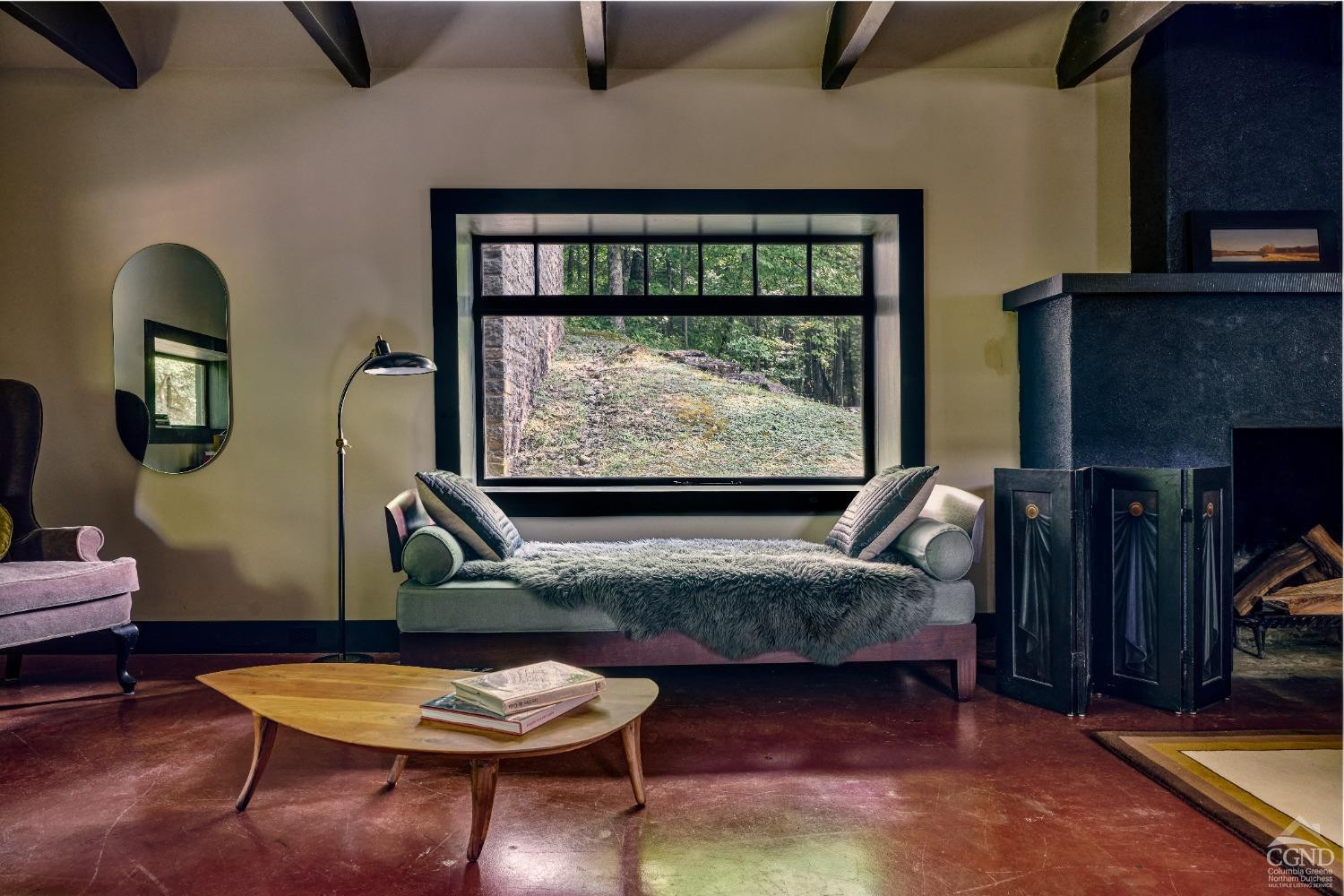 5280 Cauterskill Road Catskill, NY 12414 - Photo 19 of 55 a living room with furniture and a fireplace