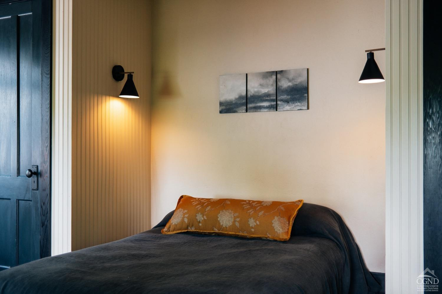 5280 Cauterskill Road Catskill, NY 12414 - Photo 36 of 55 a bedroom with a bed and wooden floor