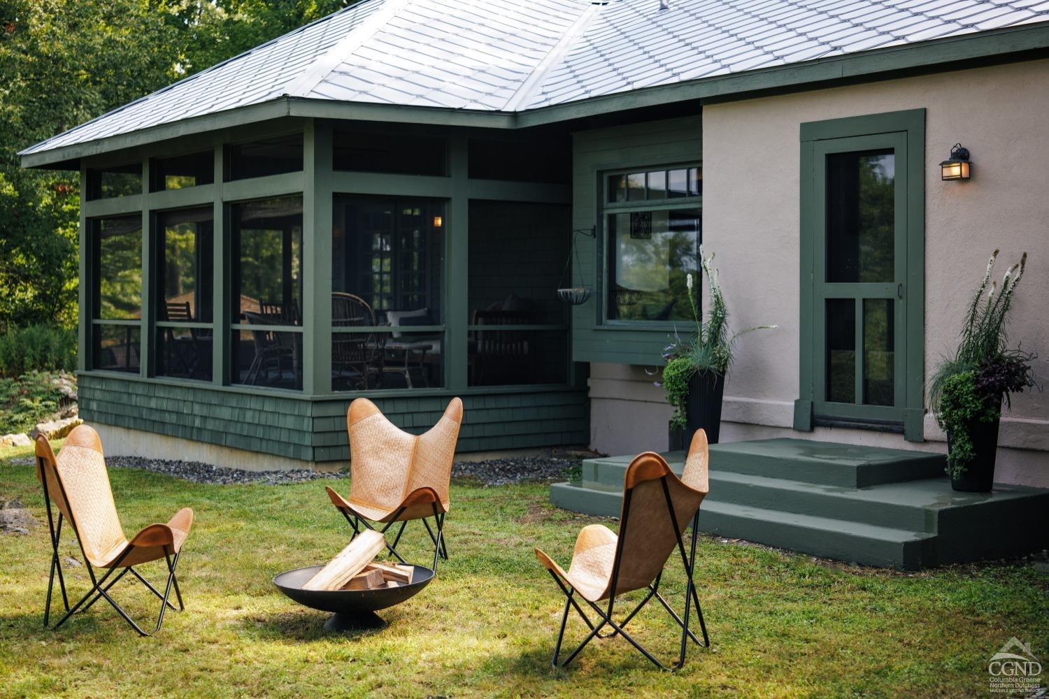 5280 Cauterskill Road Catskill, NY 12414 - Photo 39 of 55 a view of a chair and table in patio with wooden fence