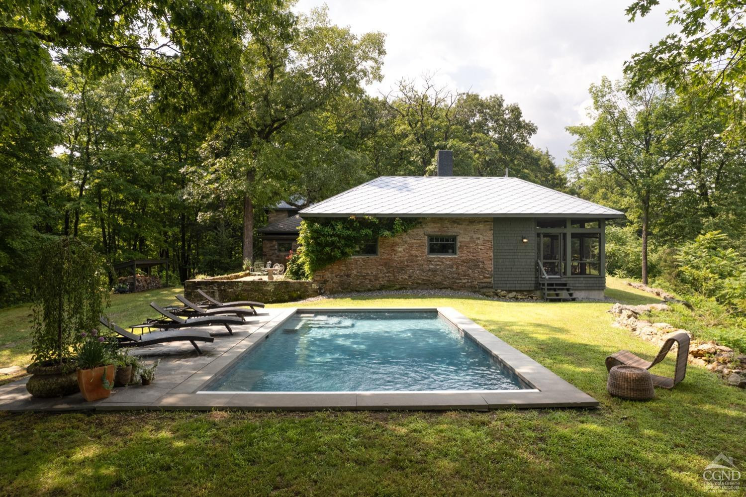 5280 Cauterskill Road Catskill, NY 12414 - Photo 45 of 55 a view of a house with swimming pool and sitting area