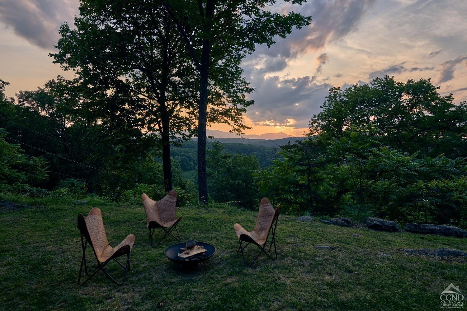 5280 Cauterskill Road Catskill, NY 12414 - Photo 47 of 55 a view of a table and chairs in the garden