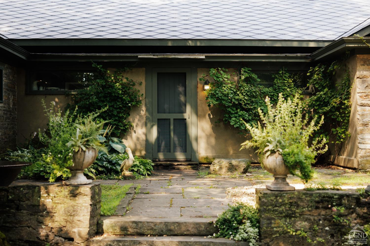 5280 Cauterskill Road Catskill, NY 12414 - Photo 9 of 55 a front view of a house with a yard