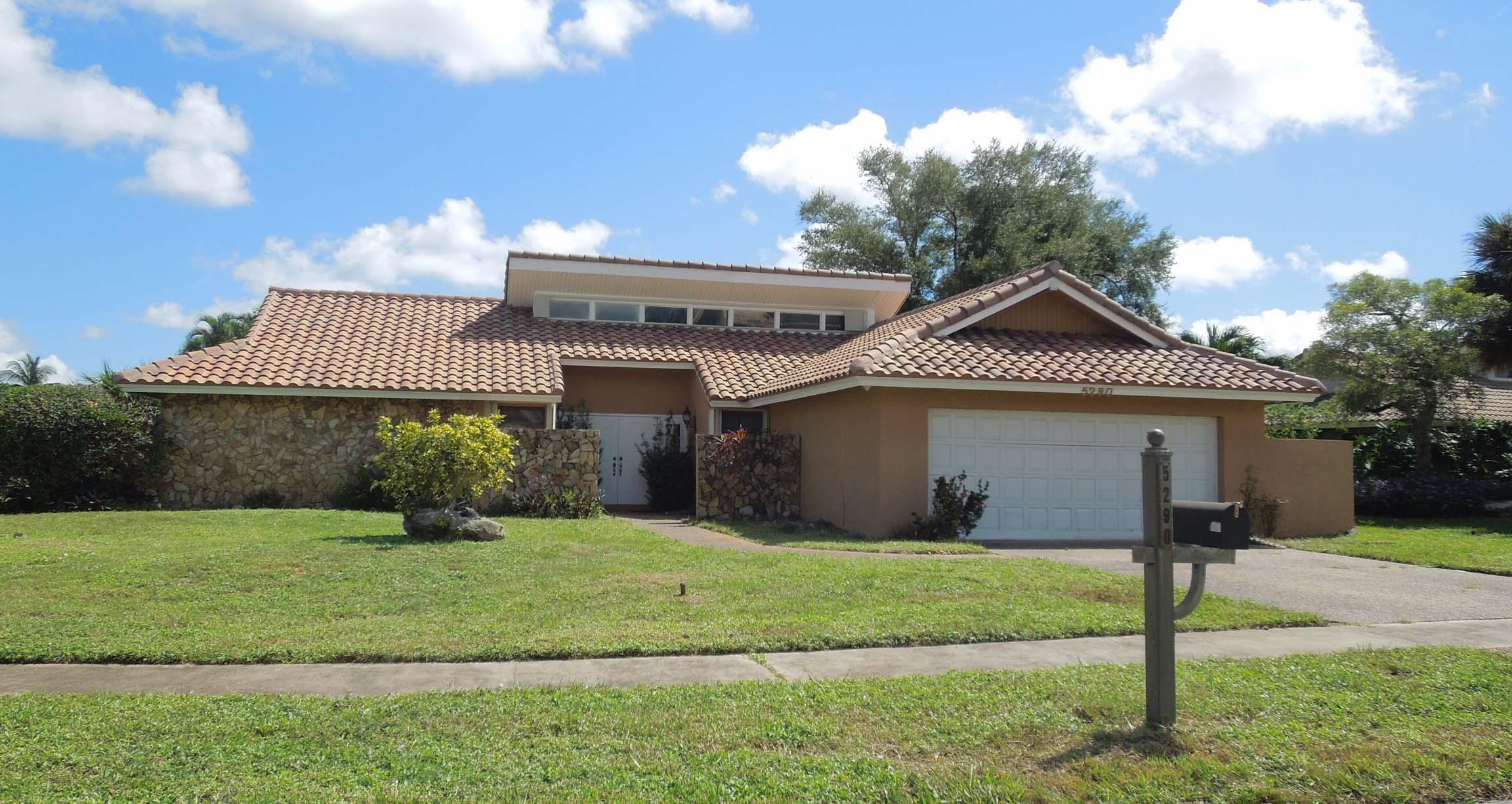 5290 Northwest 3rd Terrace Boca Raton, FL 33487 - Photo 1 of 21 Front Elevation (West)