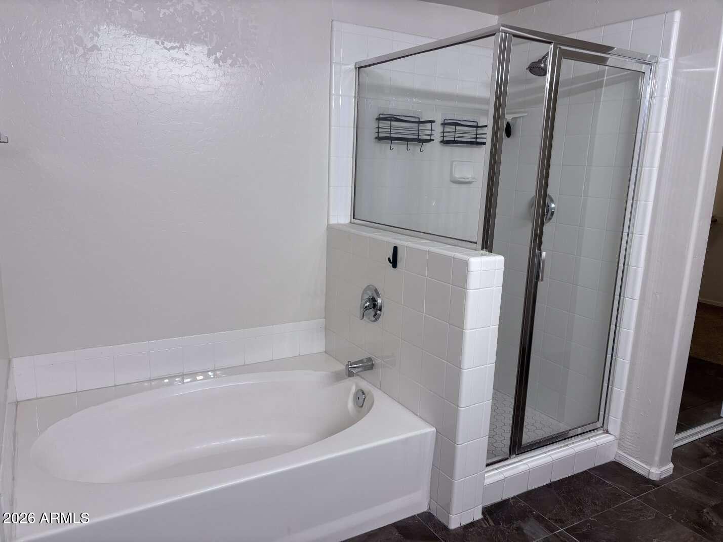 955 East Knox Road, Unit 118 Chandler, AZ 85225 - Photo 18 of 46 a bathroom with a tub and a shower