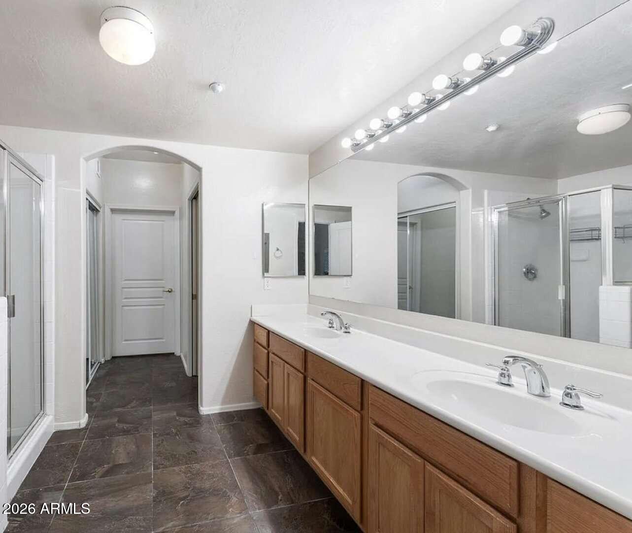 955 East Knox Road, Unit 118 Chandler, AZ 85225 - Photo 20 of 46 a spacious bathroom with a double vanity sink mirror and double