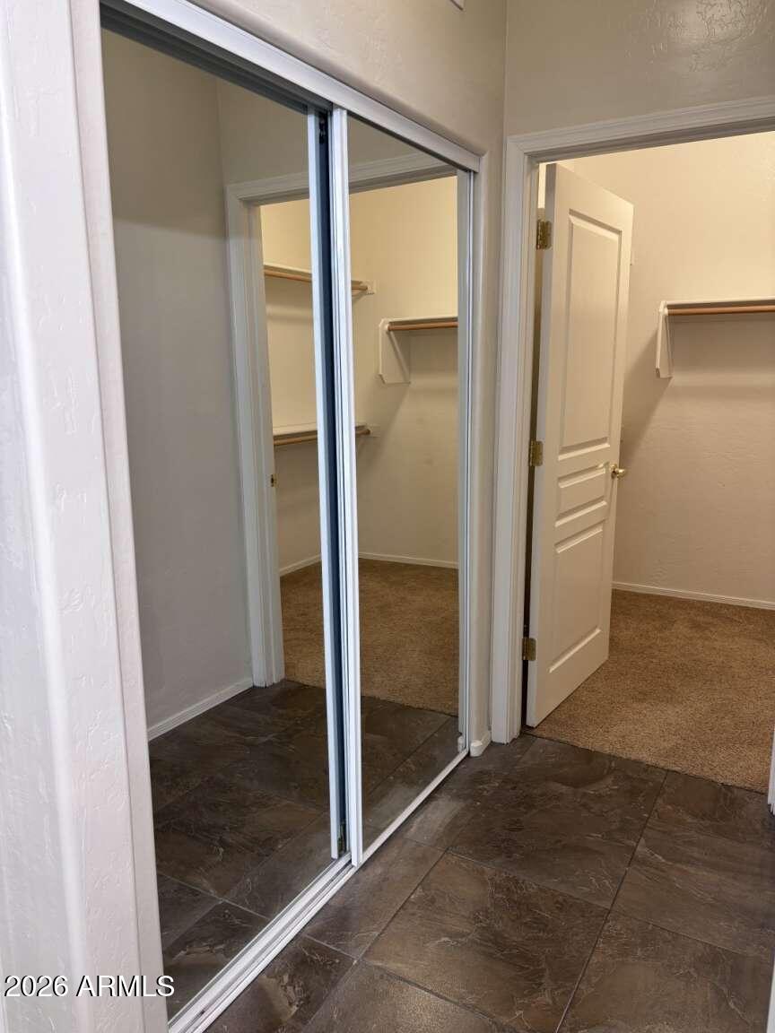 955 East Knox Road, Unit 118 Chandler, AZ 85225 - Photo 21 of 46 a view of entryway with a hallway