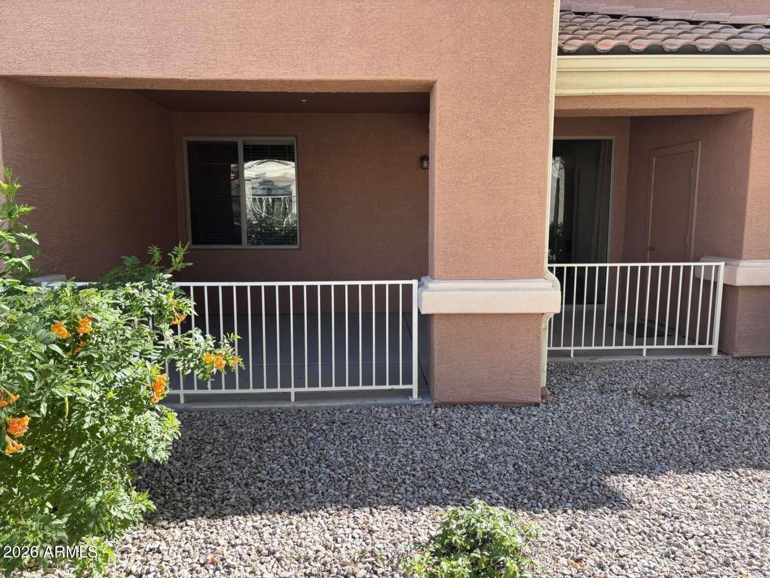 955 East Knox Road, Unit 118 Chandler, AZ 85225 - Photo 41 of 46 a view of a porch with a bench