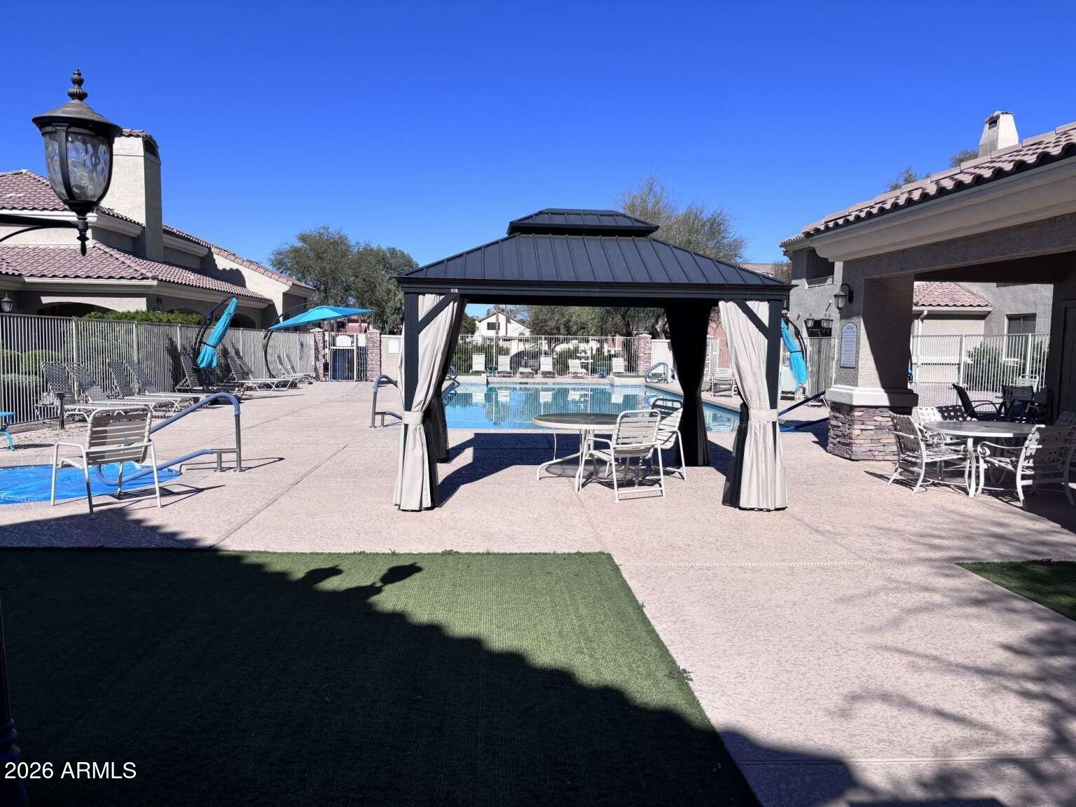 955 East Knox Road, Unit 118 Chandler, AZ 85225 - Photo 44 of 46 a view of a backyard with sitting area