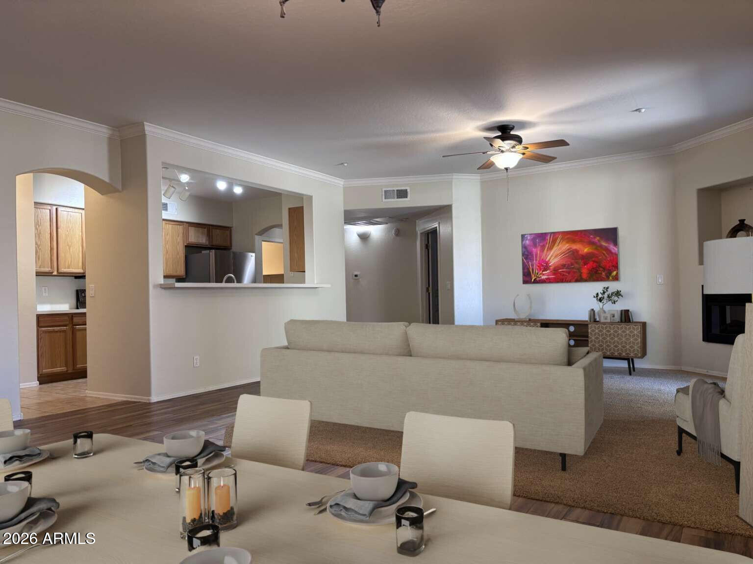 955 East Knox Road, Unit 118 Chandler, AZ 85225 - Photo 8 of 50 a living room with furniture and a flat screen tv