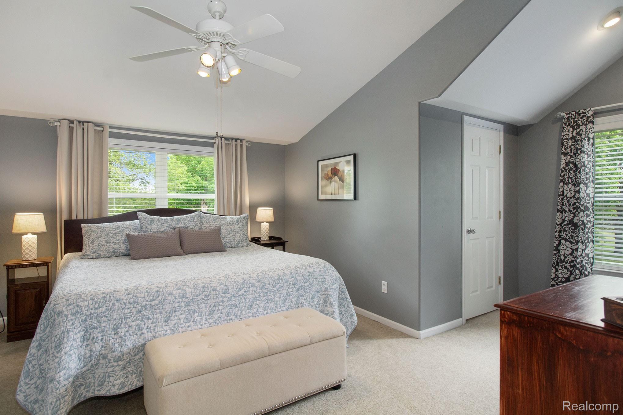 3950 Cemetery Road Fowlerville, MI 48836 - Photo 11 of 24 Large Upstairs Bedroom with Two Walk-In Closets and Lots of Interesting Details