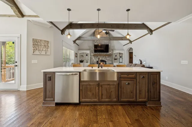 a bathroom with a bathtub and a window