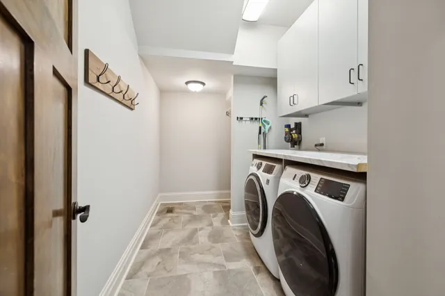 a view of a hallway with windows
