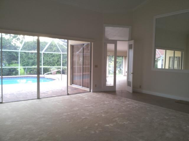 772 Parkside Circle North Boca Raton, FL 33486 - Photo 4 of 10 a view of empty room with floor to ceiling window
