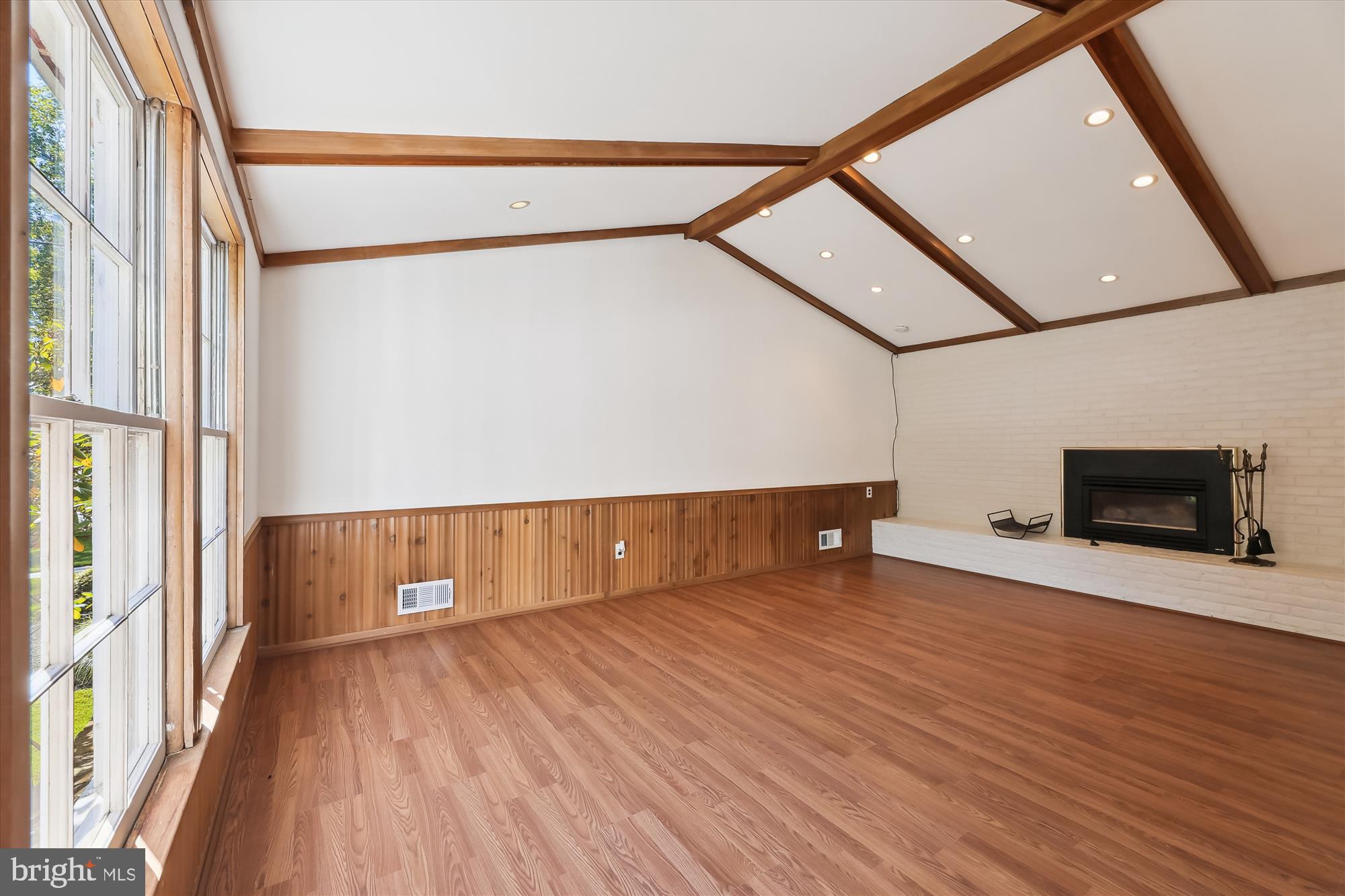 11616 Lovejoy Street Silver Spring, MD 20902 - Photo 16 of 72 View of natural light, fireplace.