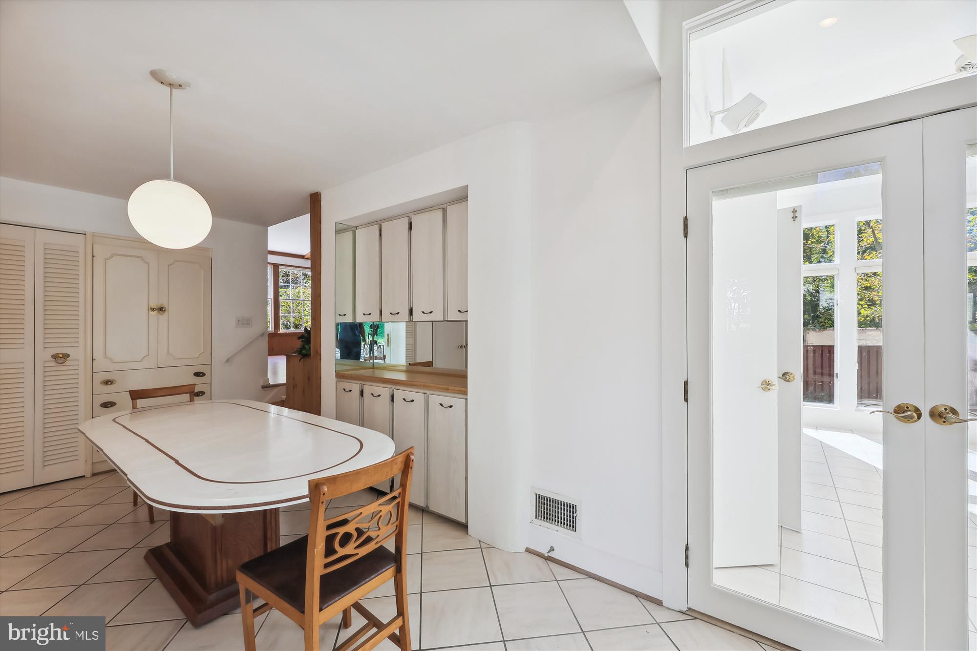 11616 Lovejoy Street Silver Spring, MD 20902 - Photo 20 of 72 Addition next to breakfast area, pantry, shelves.