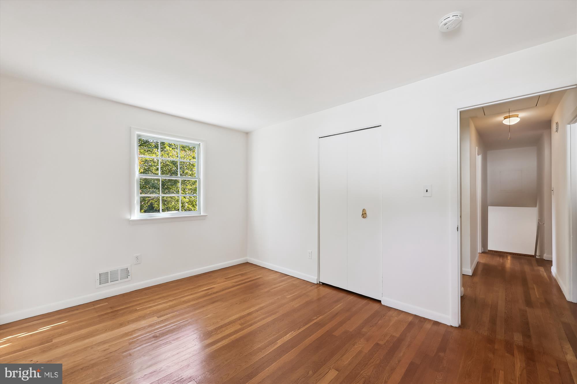 11616 Lovejoy Street Silver Spring, MD 20902 - Photo 33 of 72 Bedroom 2 wood floor, closet, entry.