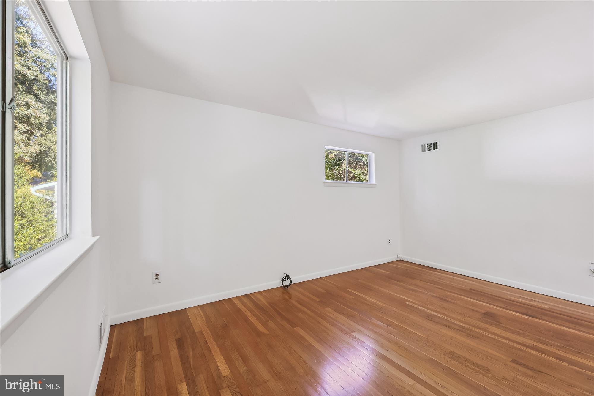 11616 Lovejoy Street Silver Spring, MD 20902 - Photo 41 of 72 2 exposures, wood flooring.