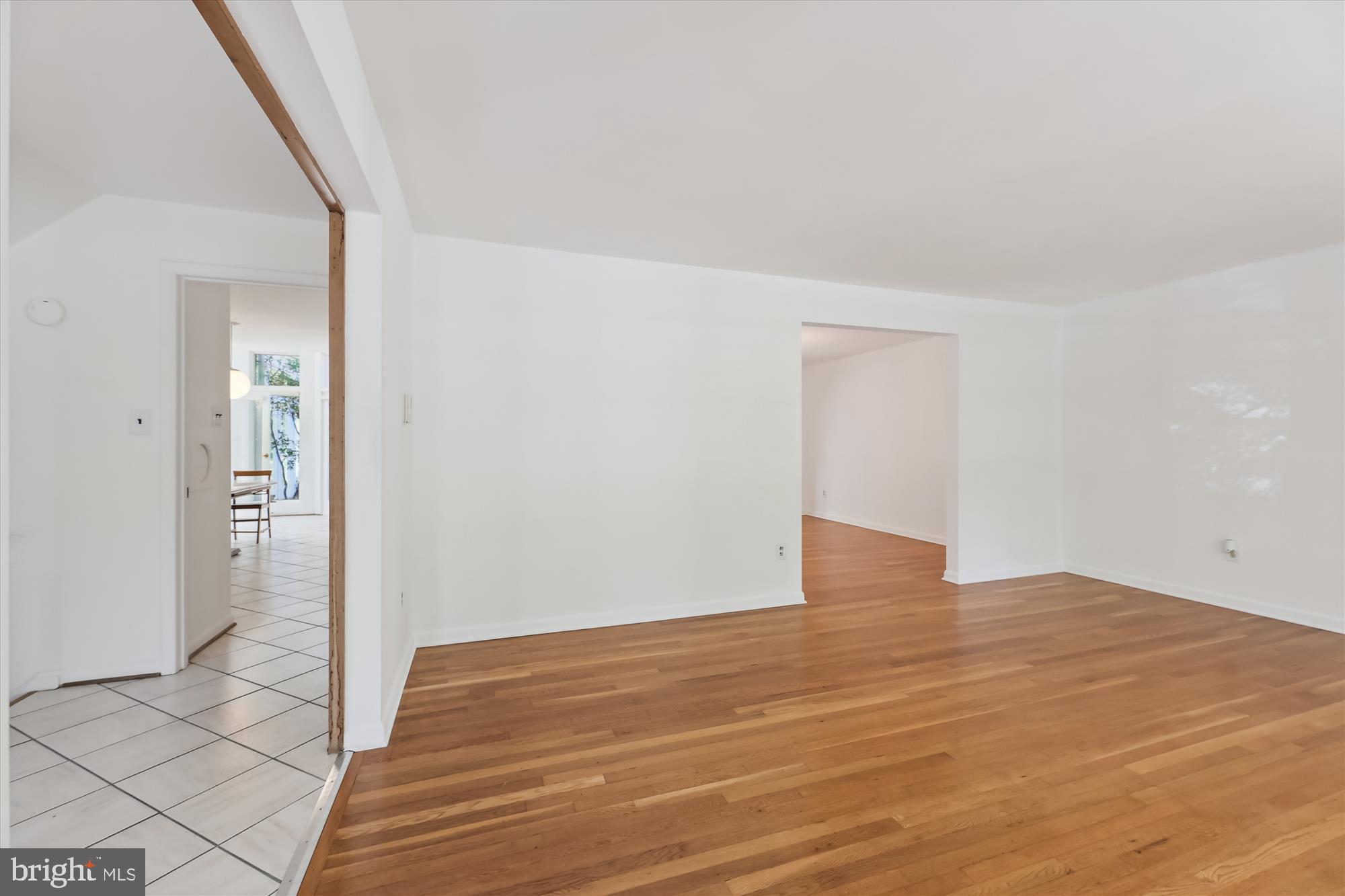 11616 Lovejoy Street Silver Spring, MD 20902 - Photo 7 of 72 Living room connects to dining room.