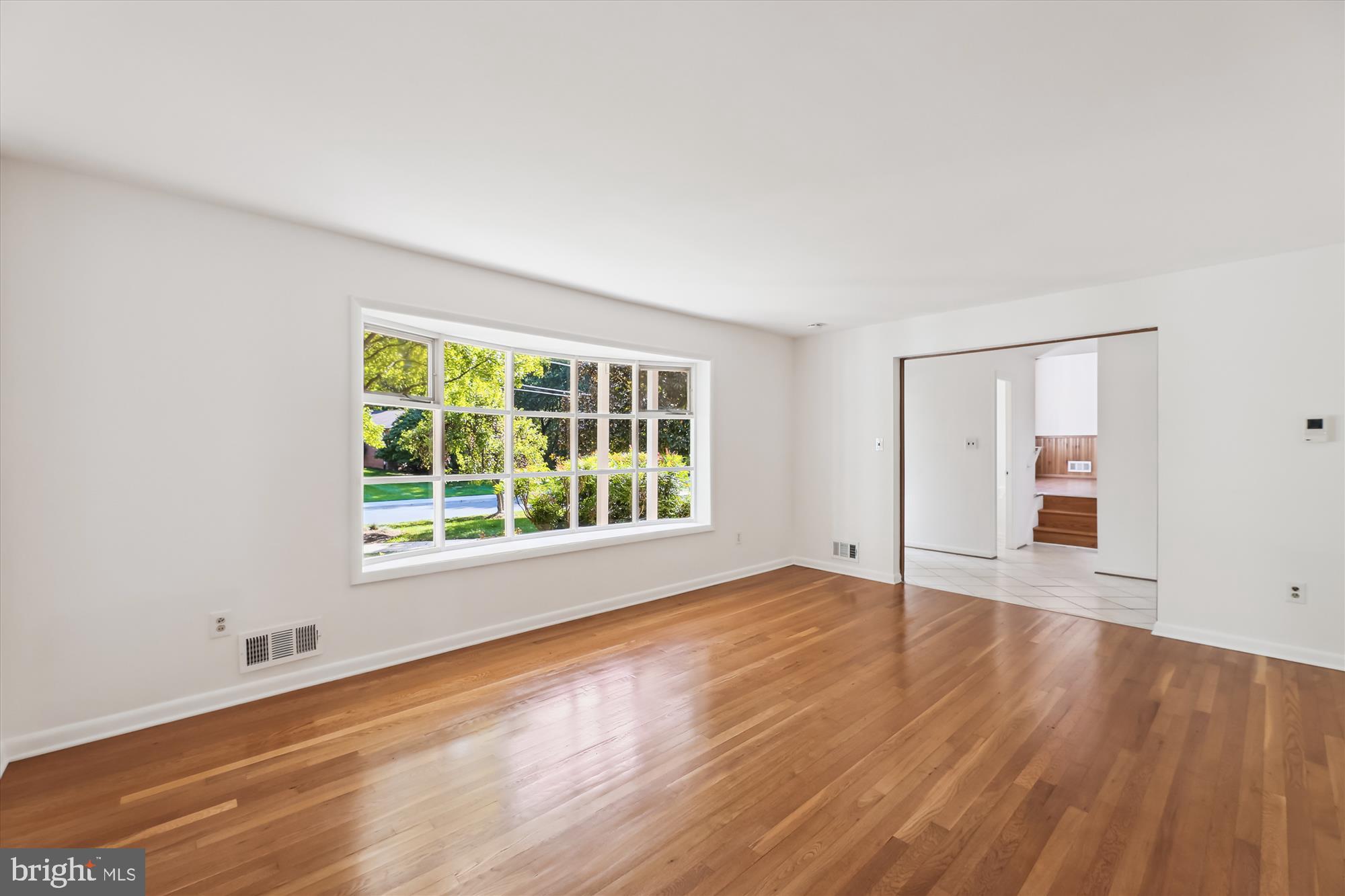 11616 Lovejoy Street Silver Spring, MD 20902 - Photo 8 of 72 Living room with natural light.