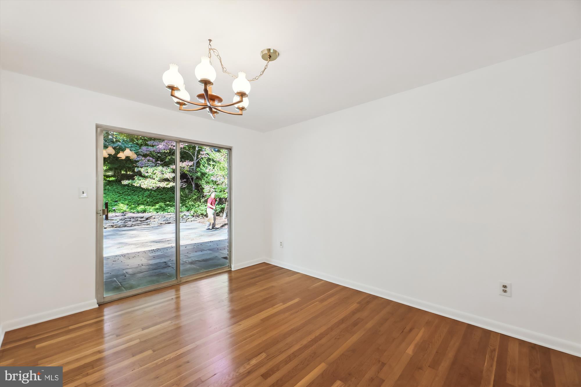 11616 Lovejoy Street Silver Spring, MD 20902 - Photo 10 of 72 Dining room with wood floors, sliders to patio!