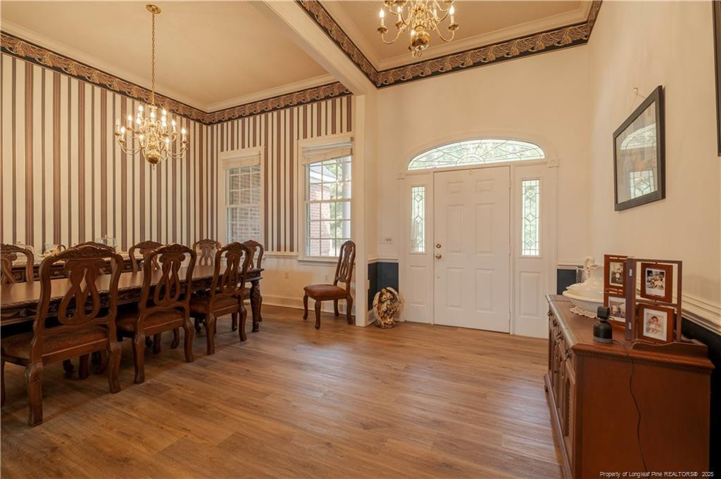 515 Briarwood Road Warsaw, NC 28398 - Photo 12 of 36 a view of a a dining room with furniture window and wooden floor