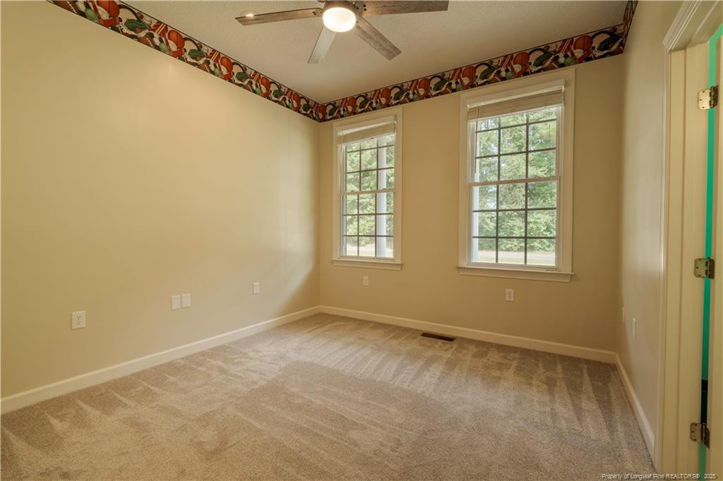 515 Briarwood Road Warsaw, NC 28398 - Photo 19 of 36 a view of an empty room with a window