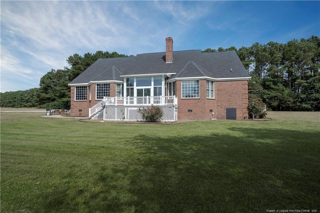 515 Briarwood Road Warsaw, NC 28398 - Photo 25 of 36 a front view of house with yard and green space