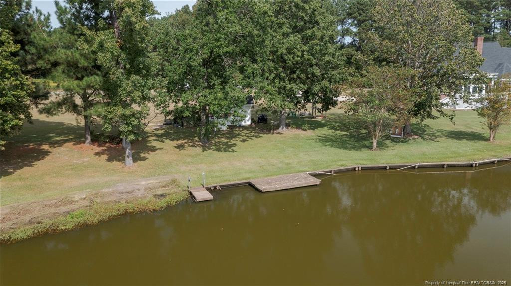 515 Briarwood Road Warsaw, NC 28398 - Photo 31 of 36 a view of a lake with houses