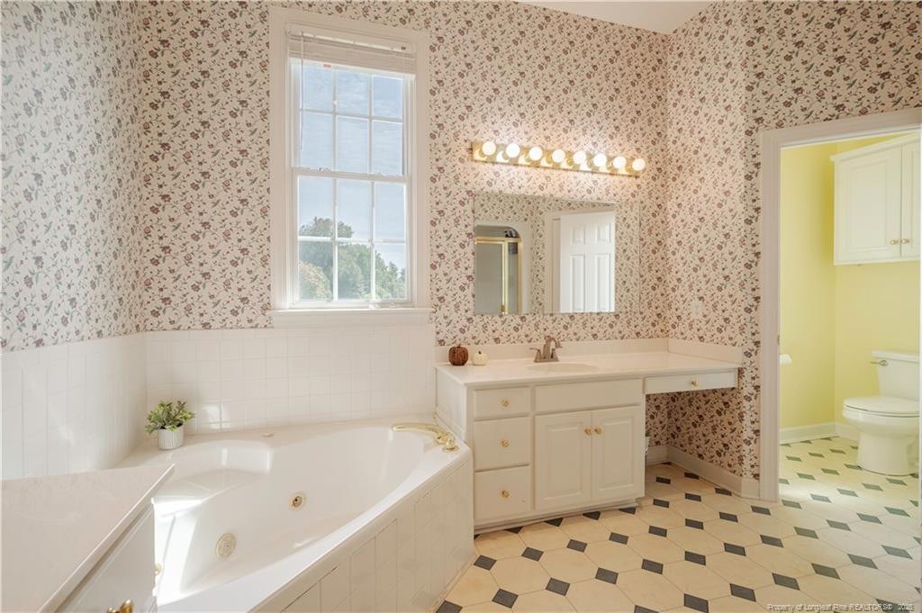 515 Briarwood Road Warsaw, NC 28398 - Photo 36 of 36 a bathroom with a sink a toilet and shower