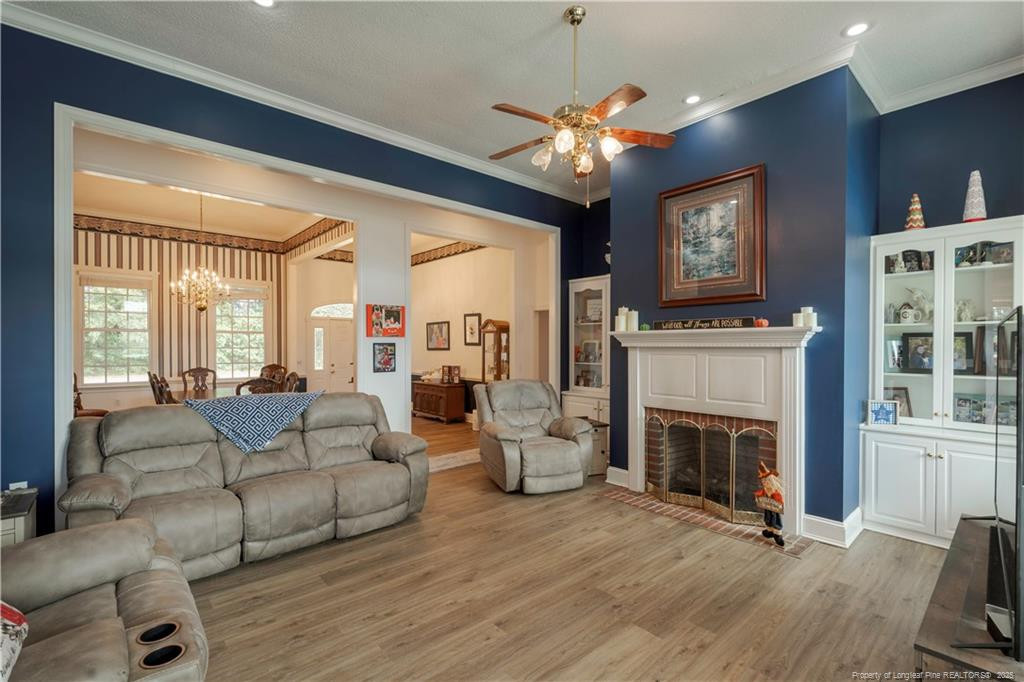 515 Briarwood Road Warsaw, NC 28398 - Photo 6 of 36 a living room with furniture and a fireplace