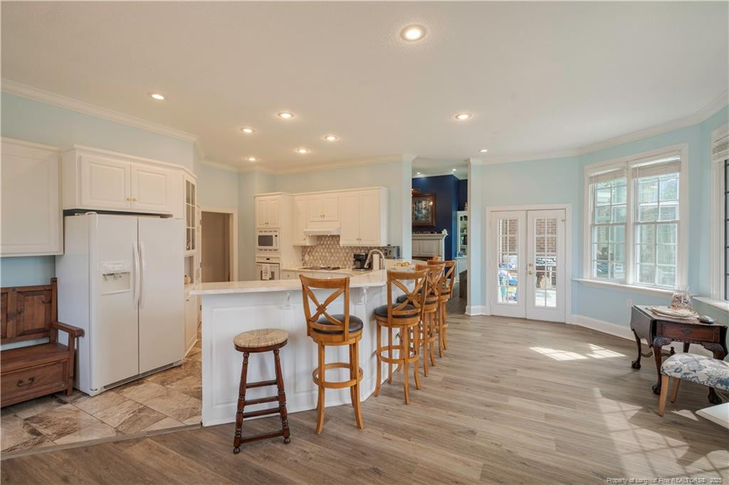 515 Briarwood Road Warsaw, NC 28398 - Photo 10 of 36 a view of a dining room with furniture and wooden floor