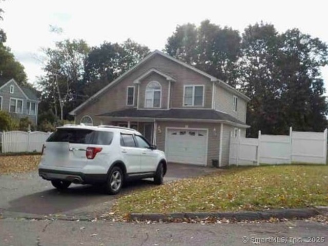 5 Lorraine Terrace Middletown, CT 06457 - Photo 2 of 2 a car parked in front of white house