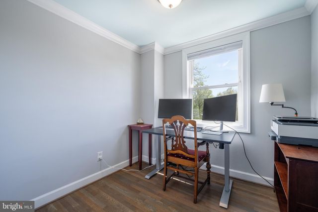 a view of a workspace with furniture