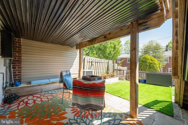 a patio view with a garden
