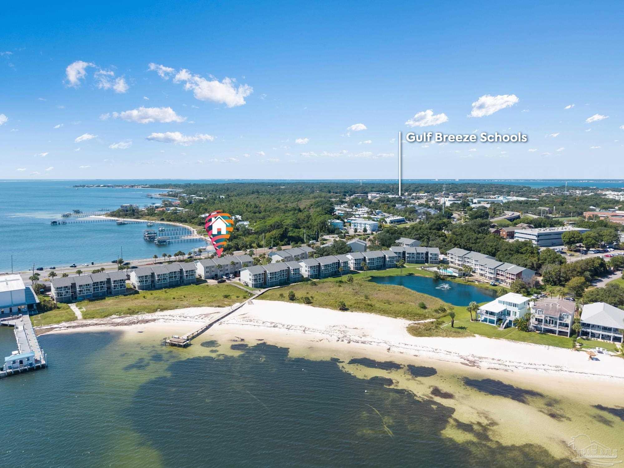 200 Pensacola Beach Road, Unit D2 Gulf Breeze, FL 32561 - Photo 39 of 40 a view of a swimming pool with a table and chairs