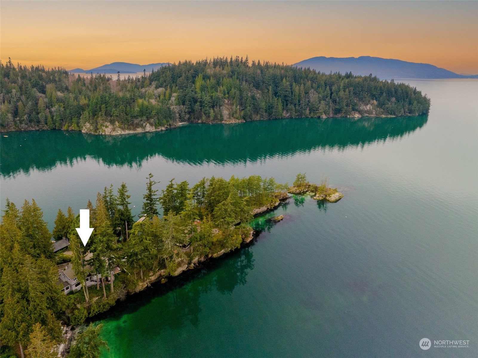 316 Chuckanut Point Road Bellingham, WA 98229 - Photo 1 of 40 a view of a lake in middle of the town