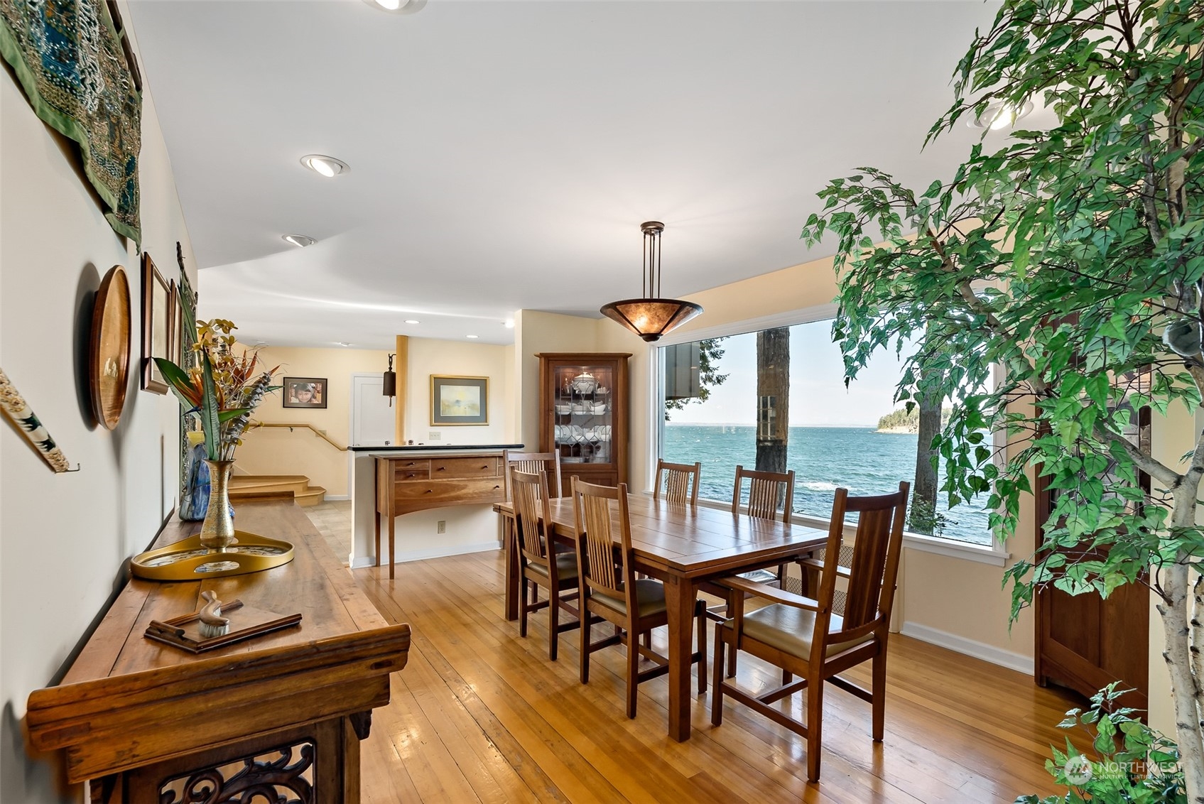 316 Chuckanut Point Road Bellingham, WA 98229 - Photo 15 of 40 a view of a dining room with furniture and wooden floor