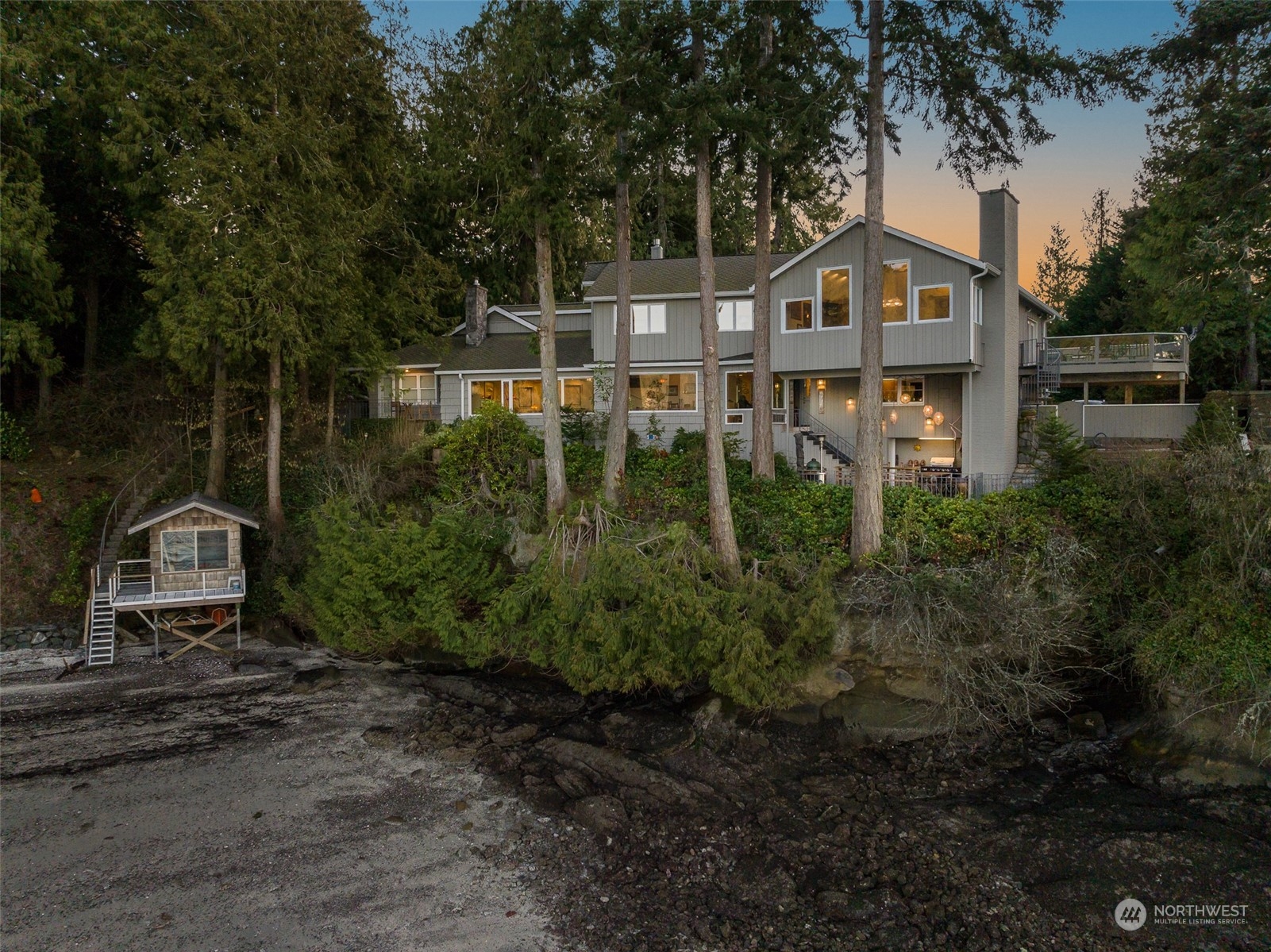 316 Chuckanut Point Road Bellingham, WA 98229 - Photo 2 of 40 a house view with a garden space