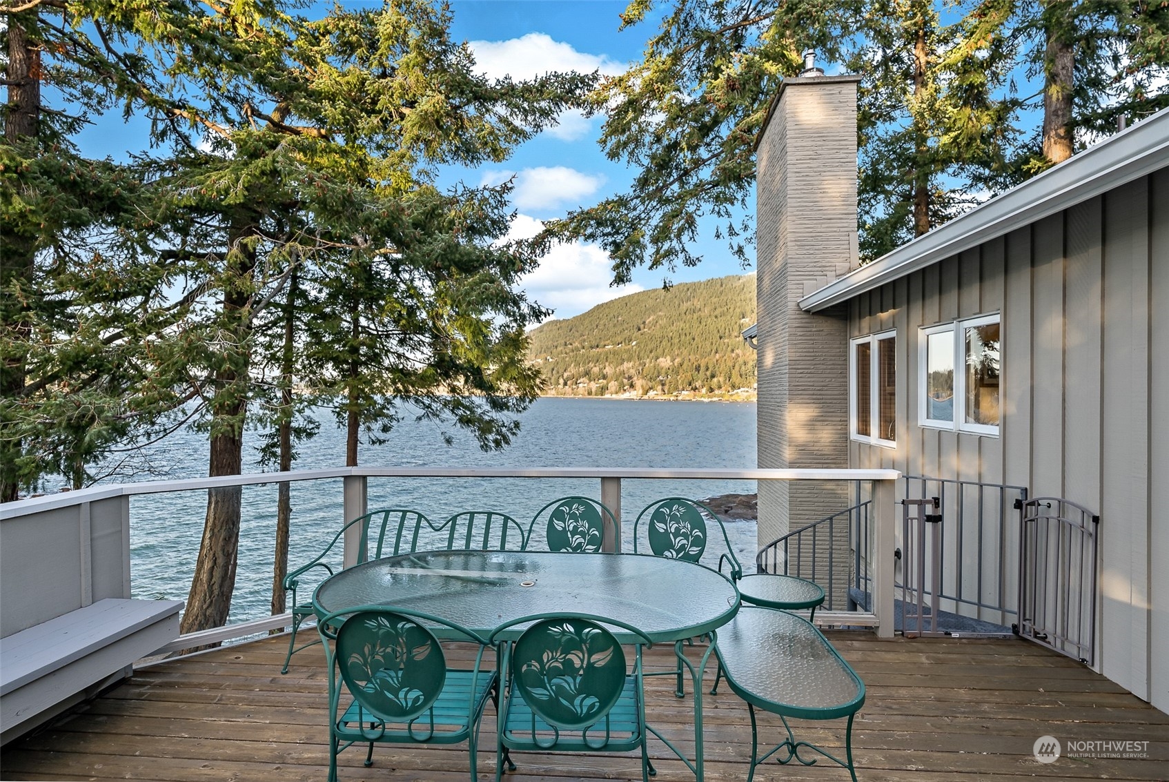 316 Chuckanut Point Road Bellingham, WA 98229 - Photo 34 of 40 a view of balcony with table and chairs