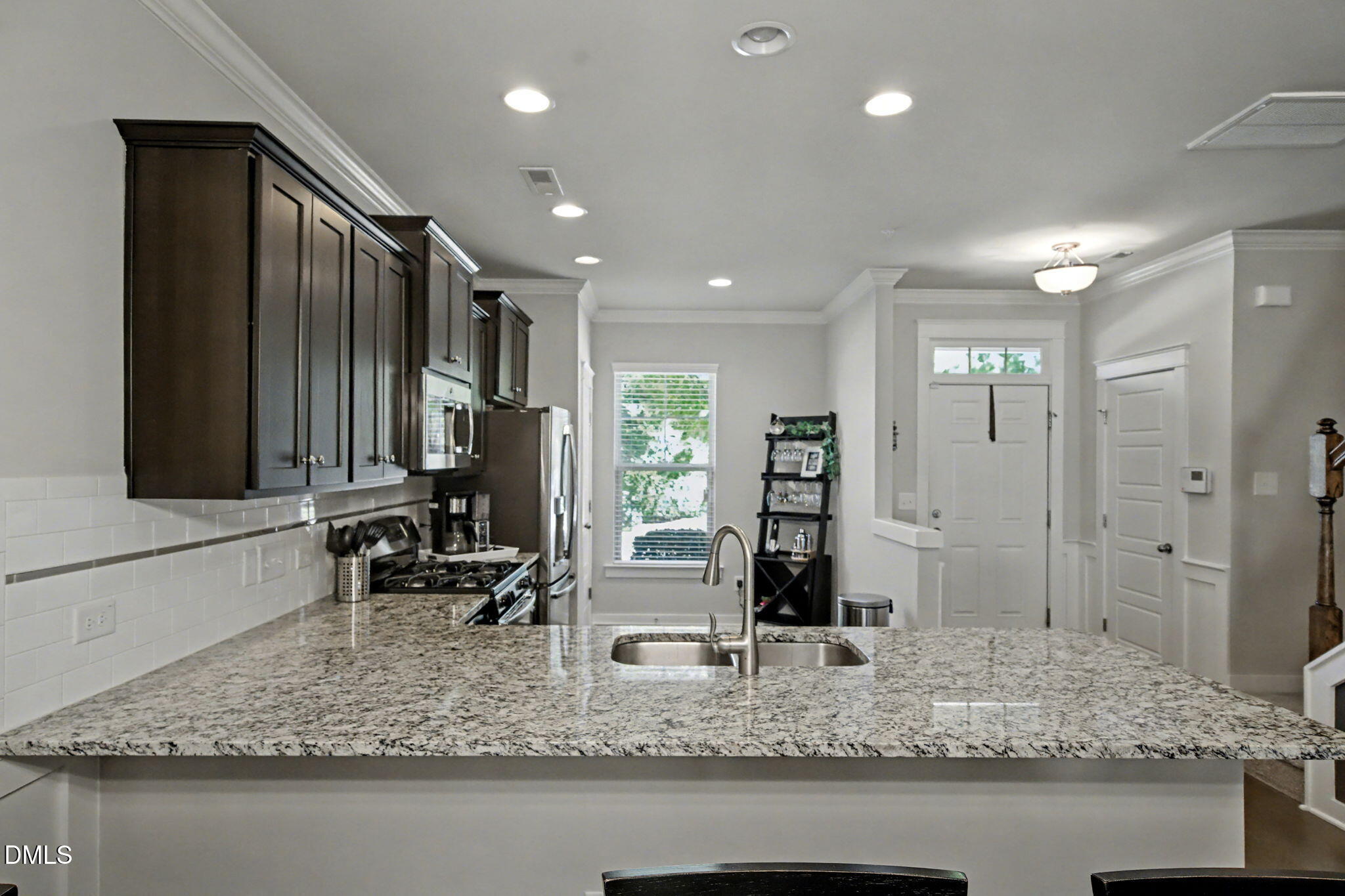 6321 Pesta Court Raleigh, NC 27612 - Photo 10 of 26 a bathroom with sink mirror and double