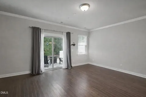 a bathroom with a double vanity sink toilet and a mirror