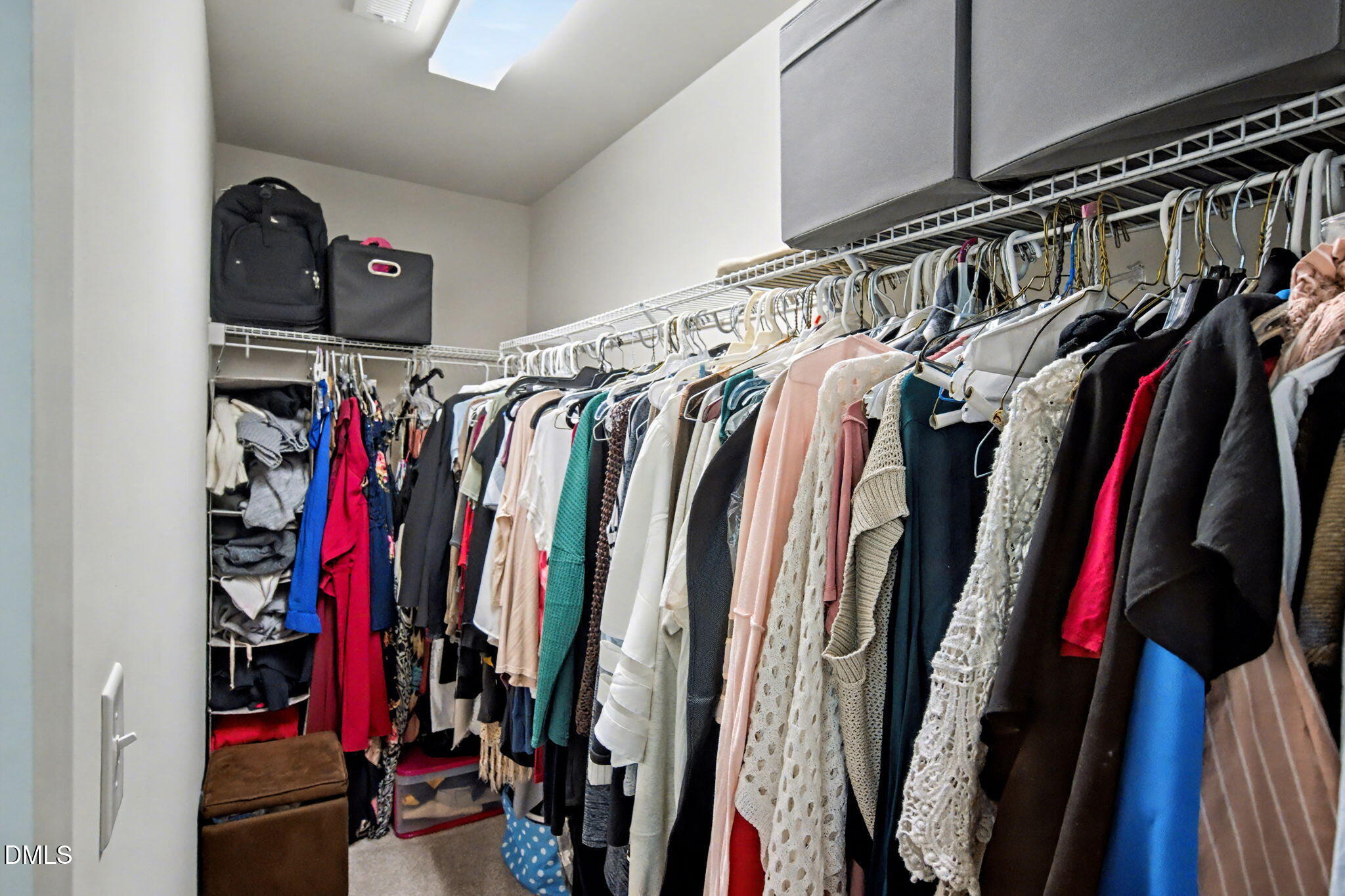 6321 Pesta Court Raleigh, NC 27612 - Photo 18 of 26 a view of walk in closet with clothes